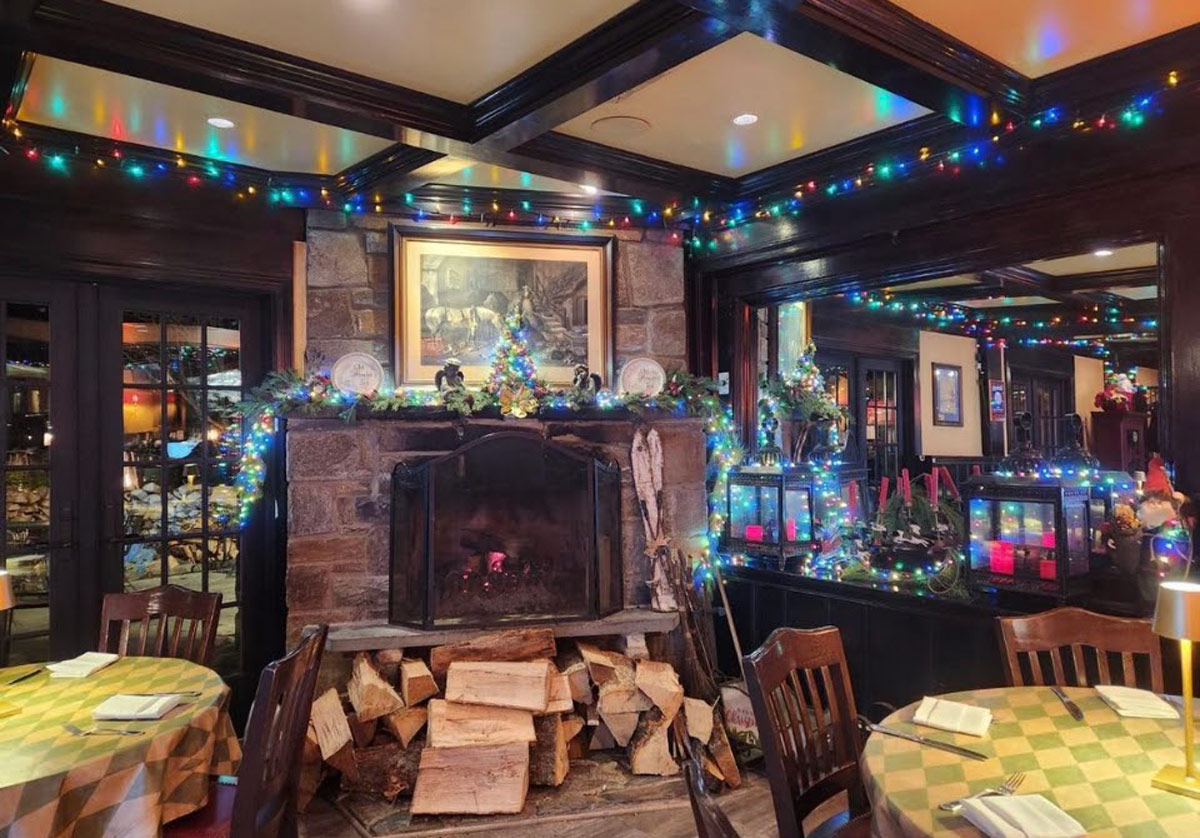 Interior, dining area with a fireplace